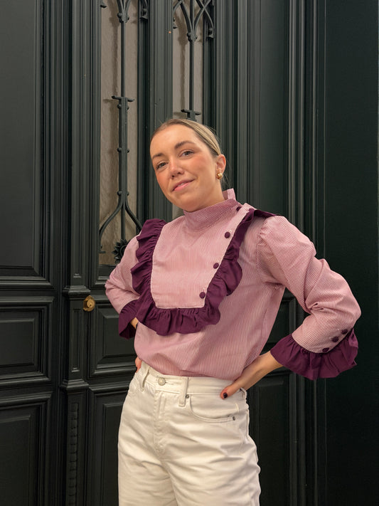 Blusa Juliette raya berenjena al tono